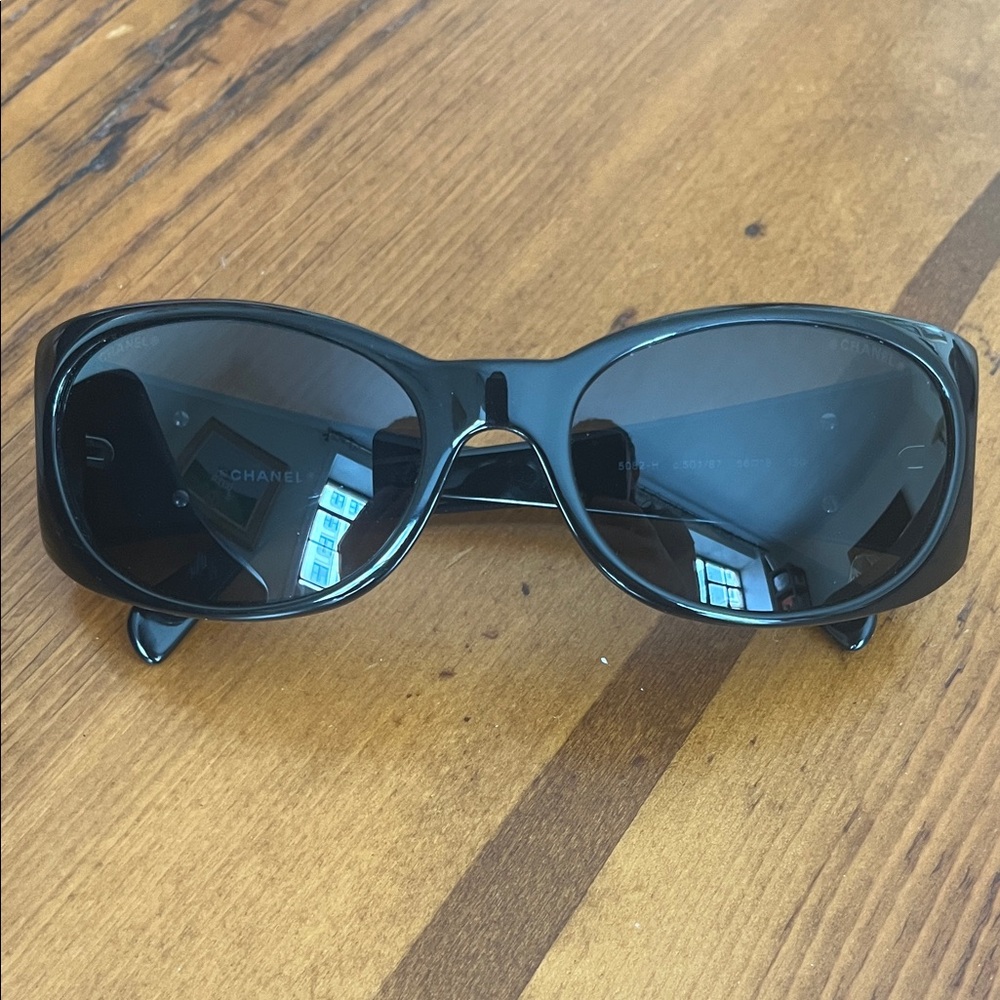 CHANEL Black Sunglasses with Crystal Logo